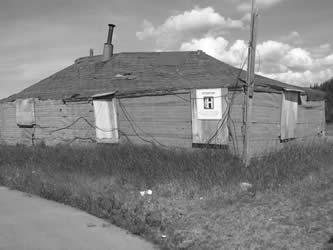 Miller House structure was built by the U.S. Army during WWII and used as a float plane base office alongside a float plane dock and a windsock pole.