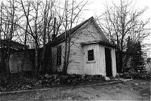 The Farley House is believed to have been one of the first frame houses constructed in Whitehorse. It was located on the NW corner of Main Street and Fifth Avenue, where the Pine Medical Clinic now stands.